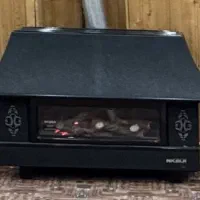 بخاری نیک کالا طرح شومینه ۳۰۰۰۰ درحد نو