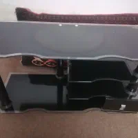 میز تلویزیون شیشه ای.