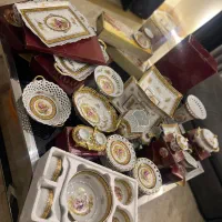 سرویس پذیرایی و گلدان و شمعدان و چراغ