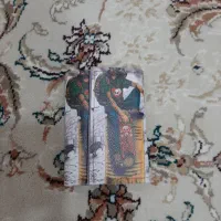 یک کیف پول به 100000هزار تومان.