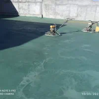 بتن ریزی کف با ماله پروانه ای