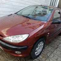 206 مدل 86تیپ دو نقدواقساط با چک سواری عالی مرتب