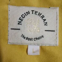 کاپشن|لباس|مشهد, کوی ولیعصر|دیوار