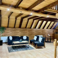 کلبه دوخوابه عاشوری تمام چوبی بانمای زیبا|اجارهٔ کوتاه‌مدت ویلا و باغ|رامسر, |دیوار