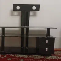 زیر تلویزیون شیشه ای