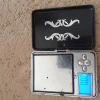 ترازو مثقال کش.