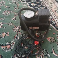 یک عدد کمپرسور باد فندکی ماشین نو