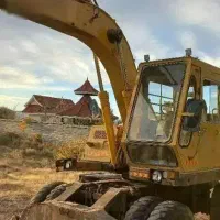 مجری بیل مکانیکی لاستیکی