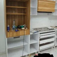 شاگرد کارگاه کابینت سازی