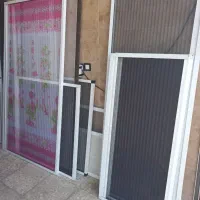 تولید و نصب انواع توری پلیسه رنگی و آلومینیومی|خدمات پیشه و مهارت|آمل, |دیوار