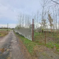 فروش زمین مسکونی دور دیوار بر آسفالت