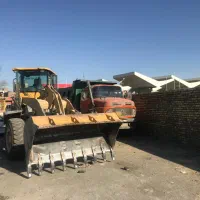 بیل لودر کمپرسی