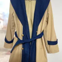 بارانی نو یک بارم پوشیده نشوده