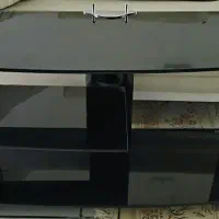 میز شیشه ای تلویزیون