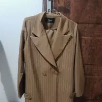 کت شلوار سایز 4یک بار تن شده قیمت مقطوع