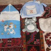 کریر  و ساک و کیسه خواب و محافظ سر کودک|کالسکه و لوازم جانبی|بناب, |دیوار