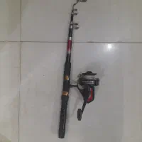 لانس ماهیگیری و تلفن رومیزی قدیمی