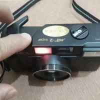 دوربین عکاسی کلکسیونی و ساعت دیجیتال نوستالژی