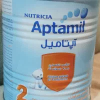 تعداد زیادی قوطی شیر خشک سالم