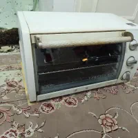 آون/توستر
