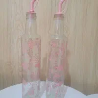 دو عدد بطری روغن ریز یا آبلیمو یا آبغوره
