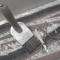 دفتین و قیچی و تیغ قالی بافی