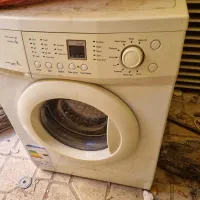 لباس شویی وگاز چهارشعله غذا خوری