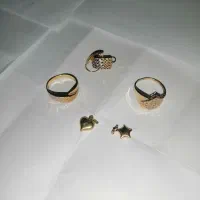 طلا فروشی (7گرم) 200 بالای تابلو