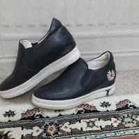 کفش زنانه و پوتین