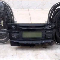 ضبط ماشین به همراه دو عدد اسپیکر قوی