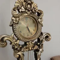 ساعت طلایی خیلی  بزرگ‌ چشمگیر و زیبا در حدنو