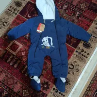 کاپشن سرهمی نوزاد