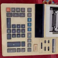 ماشین حساب لامپ نواری برقی پرینت دار