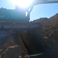 راننده بیل مکانیکی هستم