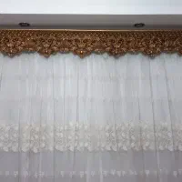 کتیبه به طول ۳مترو ۳۰سانت بادوعددمیل پرده