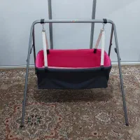 گهواره نوزادی به همراه پشه بند