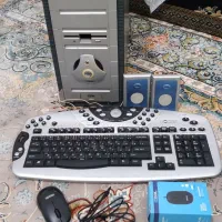 کیس کامپیوتر با کیبورد و باند و موس
