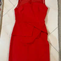 تعدادی لباس در حد نو