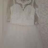 لباس عروس به همراه تور و شنل