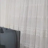 پرده بزرگ و وسایل منزل