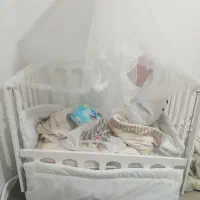 تخت کنار مادر گهواره ای