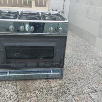 اجاق گاز فردار تمام استیل فقط شیشه جلو شکسته