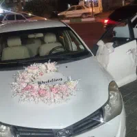 ماشین عروس و دسته گل