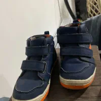 پوتین و کاپشن بچگانه