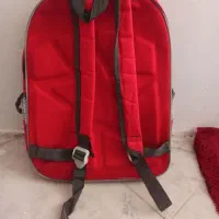 دو عدد کیف کوچک دوشی و کیف مدرسه