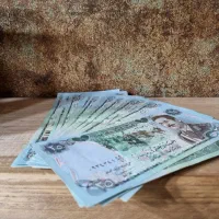 اسکناس های قدیمی و در حد اک کشور عراق تصویر صدام