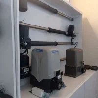 فروش اقساط درب برقی.تعمیر جک درب برقی .در برقی