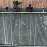 رادیاتور و آینه بغل سمت راننده ساینا