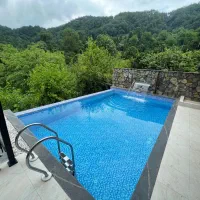 کلبه استخرداغ وسط بهشت خواب شیشه ای