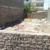 اجاره 200مترزمین خالی دیوار شده شرف آباد5